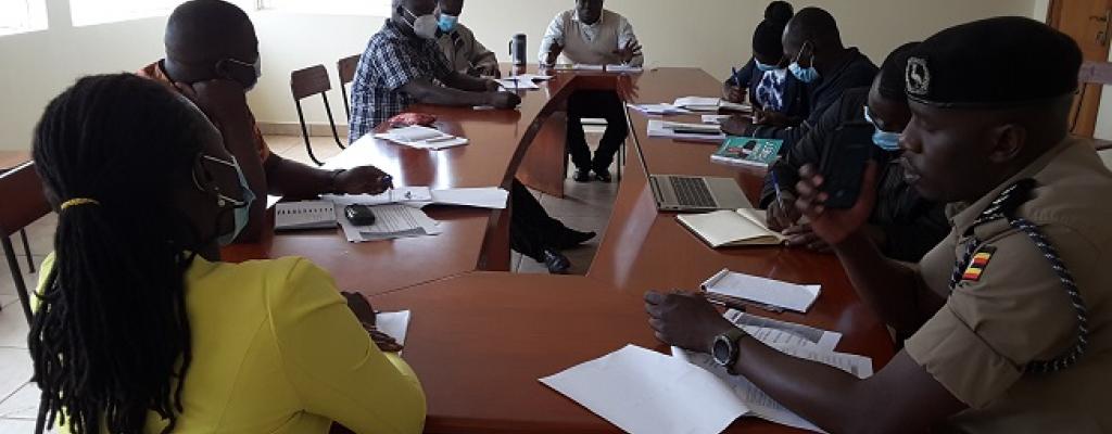 Amuru District Production Officer addressing Coffee farmers during Coffee field Day at Guruguru Sub County